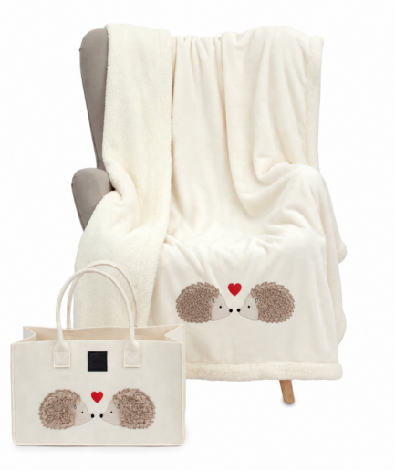 Plaid in borsa pile con ricci bianco